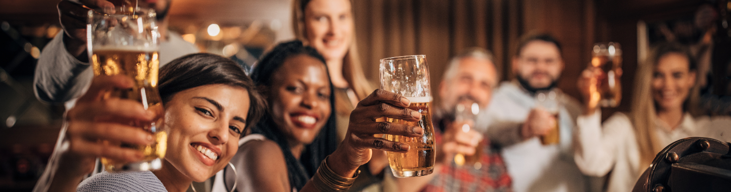 banner image of people toasting their beer glasses